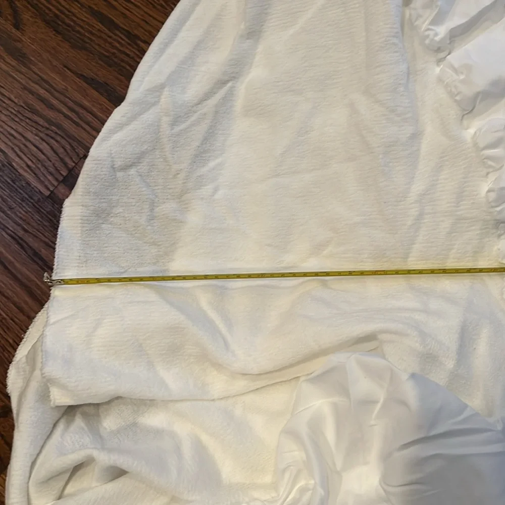 Twin  mattress cover .  Polyester - lightweight.  Deep mattress sides.